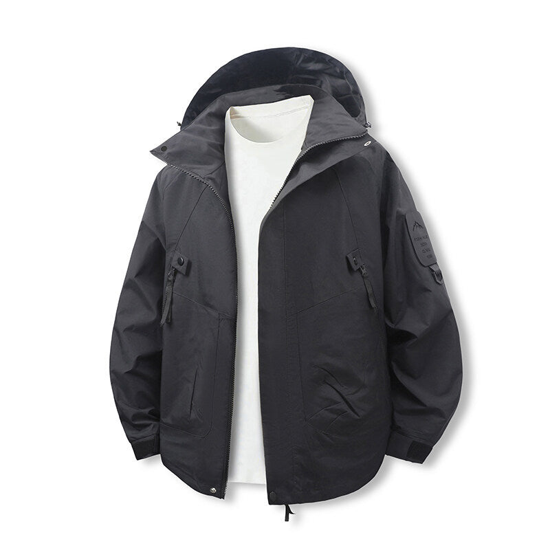 Herren funktionale Outdoor-Jacke mit verstellbarem Kapuzenbereich und zahlreichen Taschen Drune