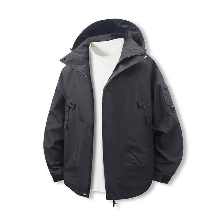 Herren funktionale Outdoor-Jacke mit verstellbarem Kapuzenbereich und zahlreichen Taschen Drune
