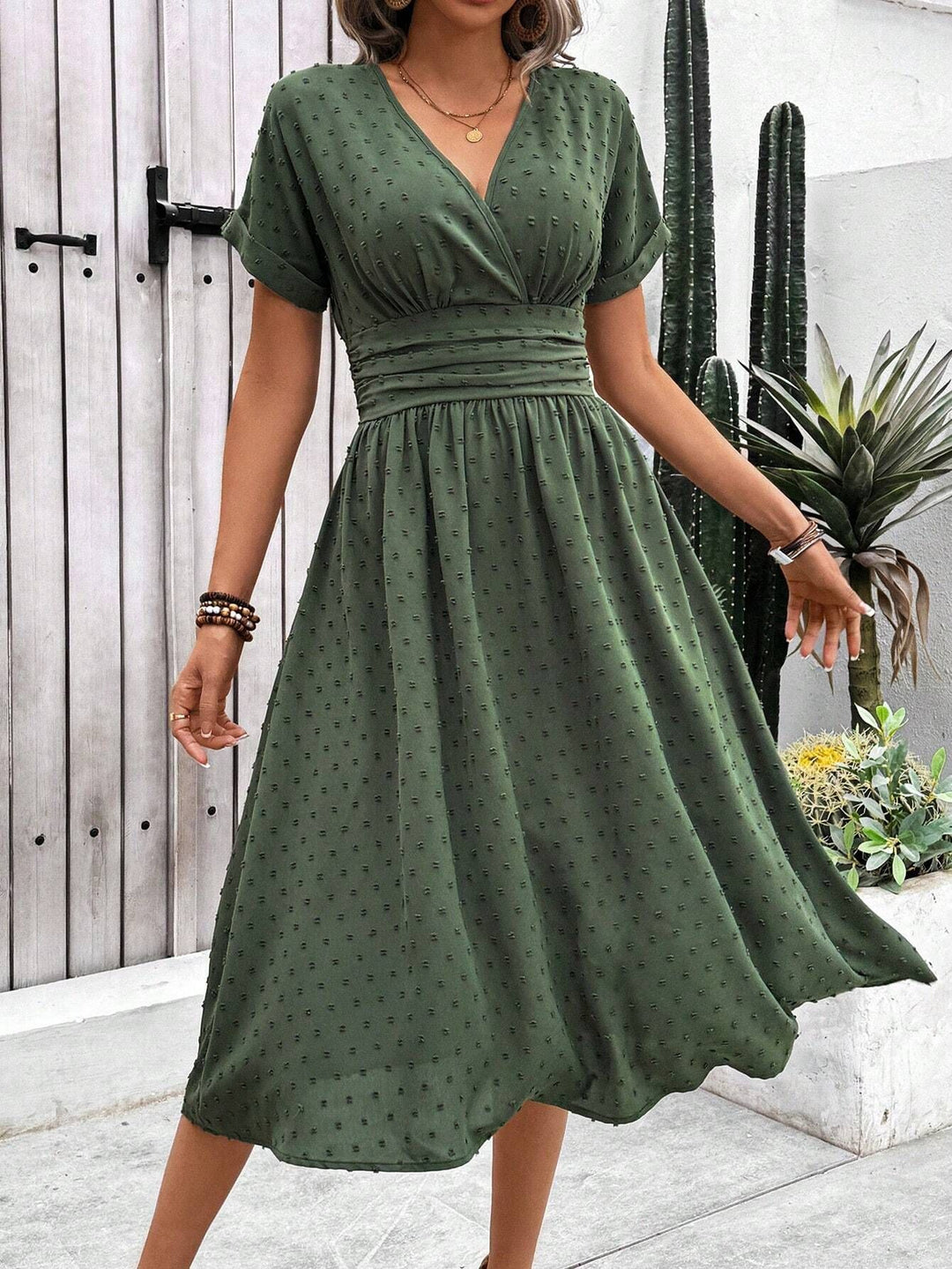 Damen midi Kleid mit gerafftem Oberteil und V-Ausschnitt Drune