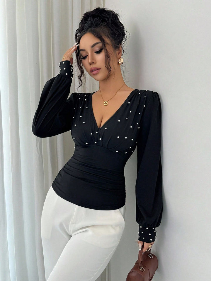 Damen elegantes Blusenshirt mit V-Ausschnitt und Verzierung Drune