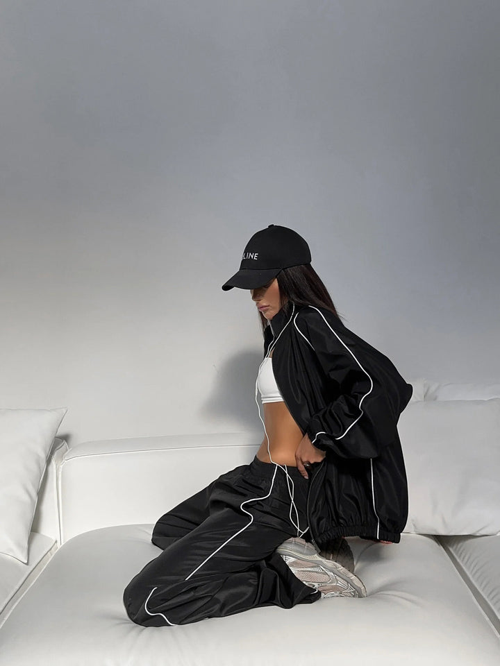 Damen Sportliche und luftige Trainingsjacke mit weit geschnittenen Hosen Drune