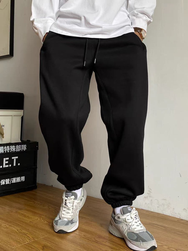 Herren nan tapered Jogginghose mit markanter Schrittnaht Kordelzug und elastischen Knöchelbündchen Drune