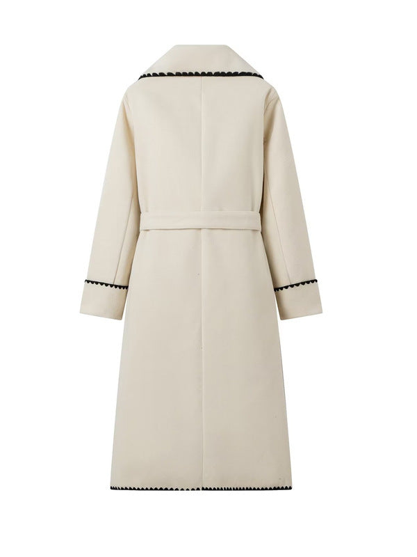 Damen eleganter Longcoat mit Bindegürtel und kontrastierenden Paspeln Drune