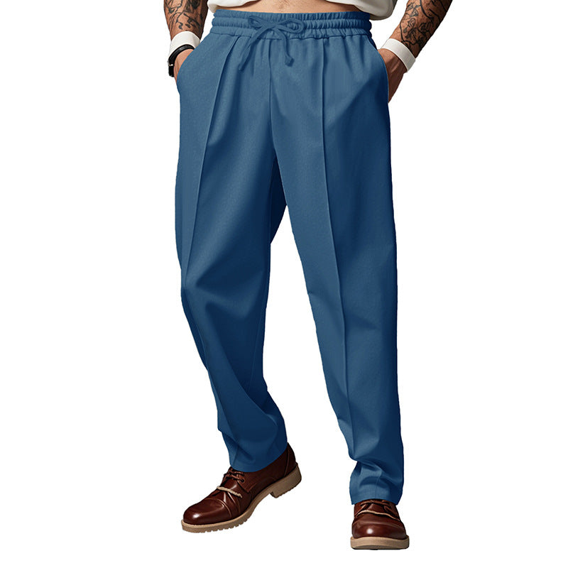 Herren nan schlanke Tapered-Jogginghose mit elastischem Tunnelzugbund, formgebender Bügelfalte und seitlichen Eingrifftaschen Drune