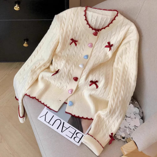 Damen Strickjacke mit verspieltem Kabelmuster und bunten Knopfdetails Drune