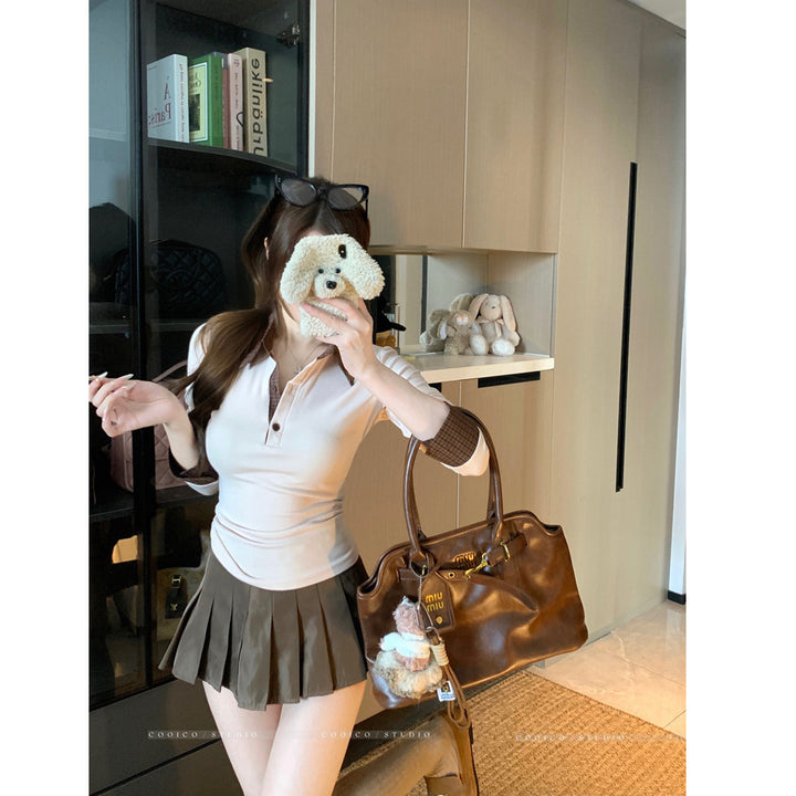 Damen Langarm-Polohemd mit stylischem Kragen und Knopfdetails Drune