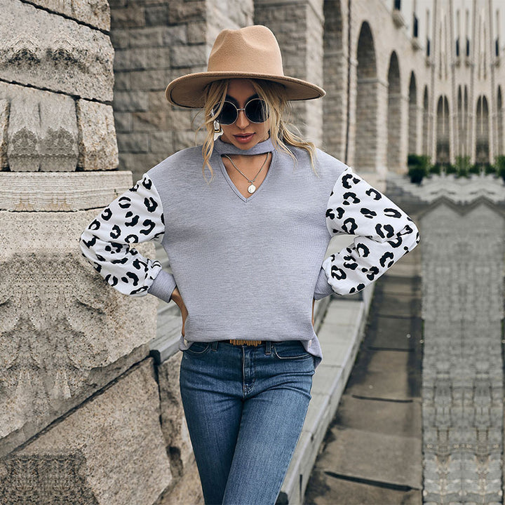 Damen Sweatshirt mit V-Ausschnitt und trendigen Leopardenärmel Drune