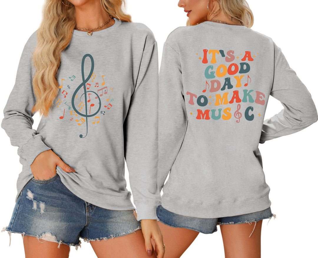 Damen Sweatshirt mit musikalischem Motiv und kreativem Schriftzug Drune