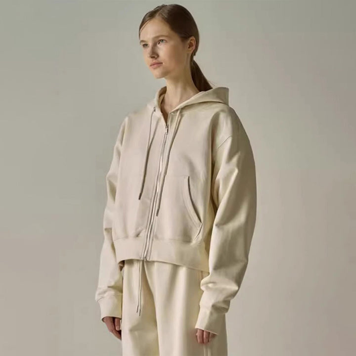Damen Kapuzen-Sweatjacke mit Reißverschluss und seitlichen Taschen Drune
