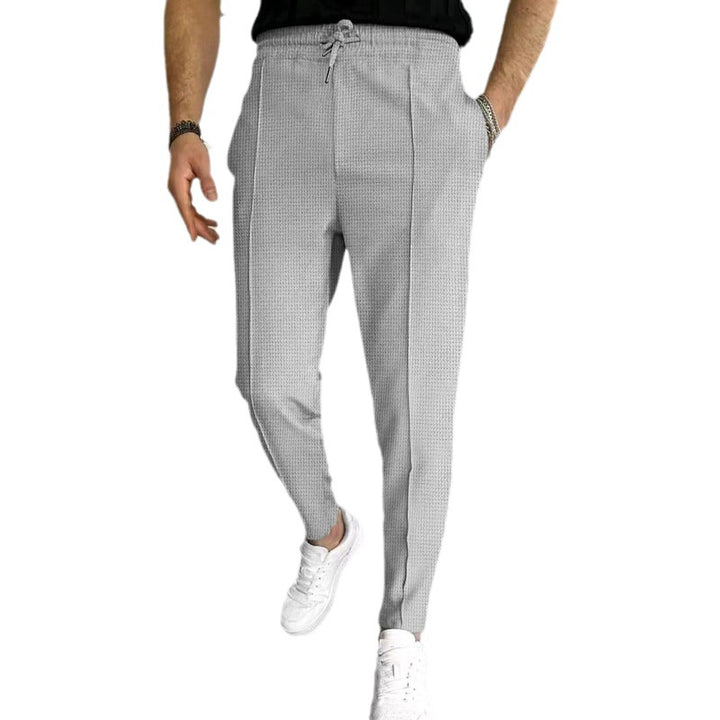 Herren nan strukturiertes Jogginghose mit elastischem Tunnelzug, formgebender Bügelfalte und tapered Bein Drune