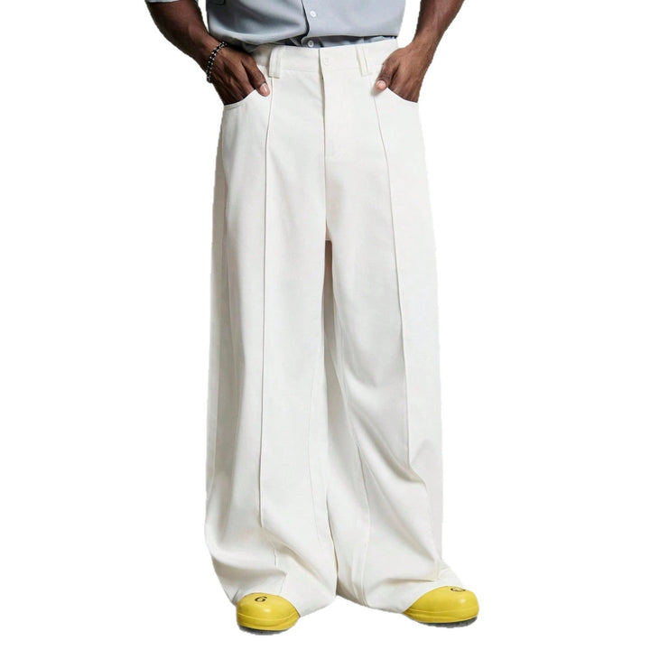 Herren nan weite Bundfaltenhose mit hoher Bundhöhe, präzisen Bügelfalten und seitlichen Eingrifftaschen Drune