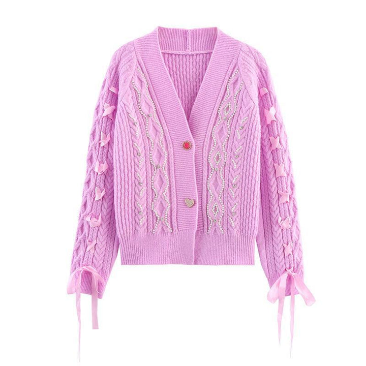 Damen Strickjacke mit detaillierter Zopfmusterung und eleganten Rüschendetails Drune