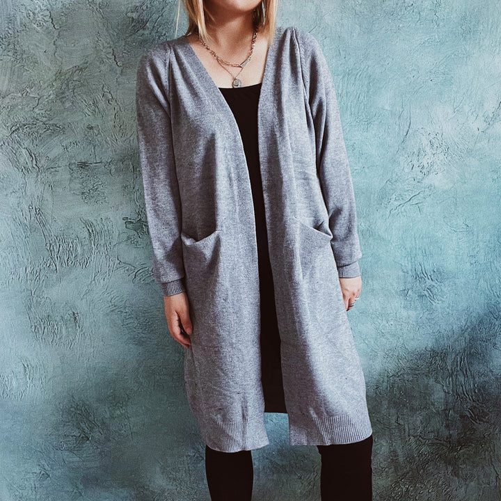 Damen lässige Strickjacke mit tiefem Schnitt und praktischen Taschen Drune