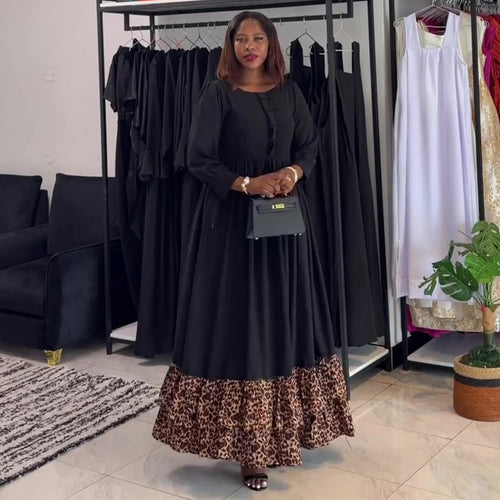 Damen Maxikleid mit schickem Rüschensaum und Knopfdetail Drune