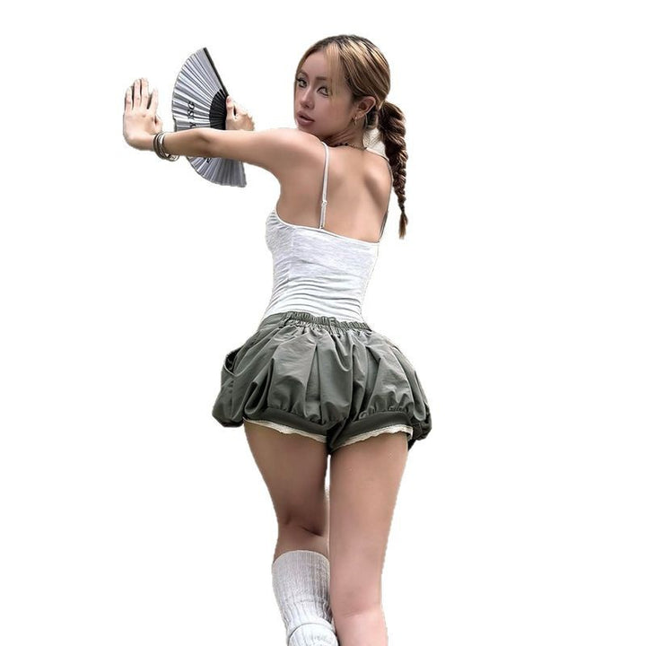 Damen modische Ballonshorts mit flatterndem Schnitt und dekorativen Knöpfen Drune