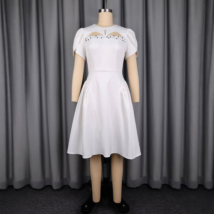 Damen Kleid mit eleganten Puffärmeln und raffinierten Cut-Outs Drune