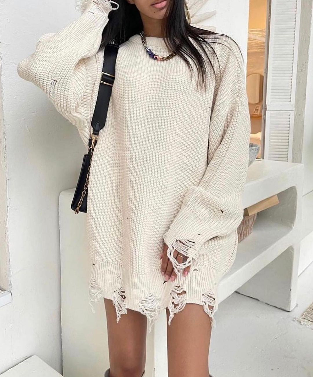 Damen Großer Strickpullover mit distressed Saum Drune