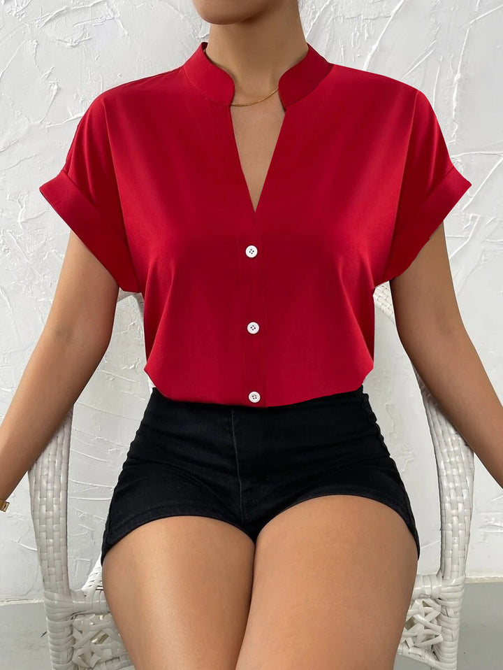 Damen Elegante Kurzarmbluse mit Stehkragen und subtilen Knopfdetails Drune