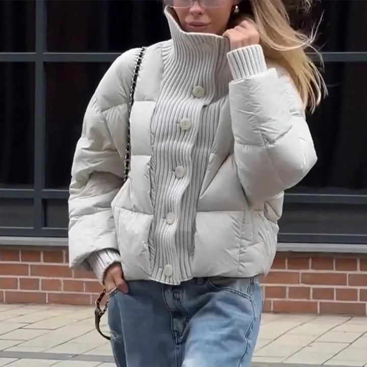 Damen gesteppte Jacke mit voluminösem Kragen und praktischen Knopfdetails Drune