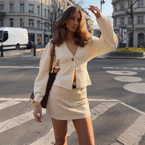 Damen modische Strickjacke mit knöpfbarem Design und weiten Ärmeln Drune