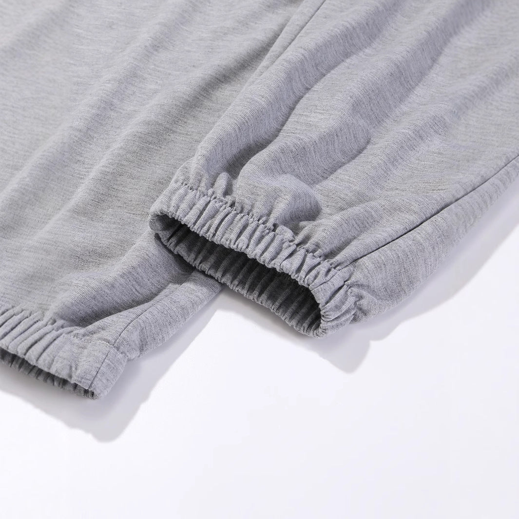 Damen bequeme Sweatpants mit trendigem Sonnenmotiv Drune