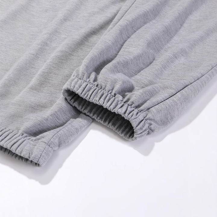 Damen bequeme Sweatpants mit trendigem Sonnenmotiv Drune