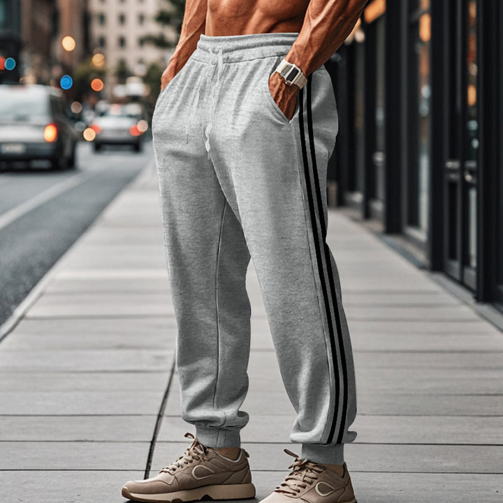 Herren Bequeme Sporthose mit kontrastierenden Seiteneinsätzen und elastischem Bund Drune