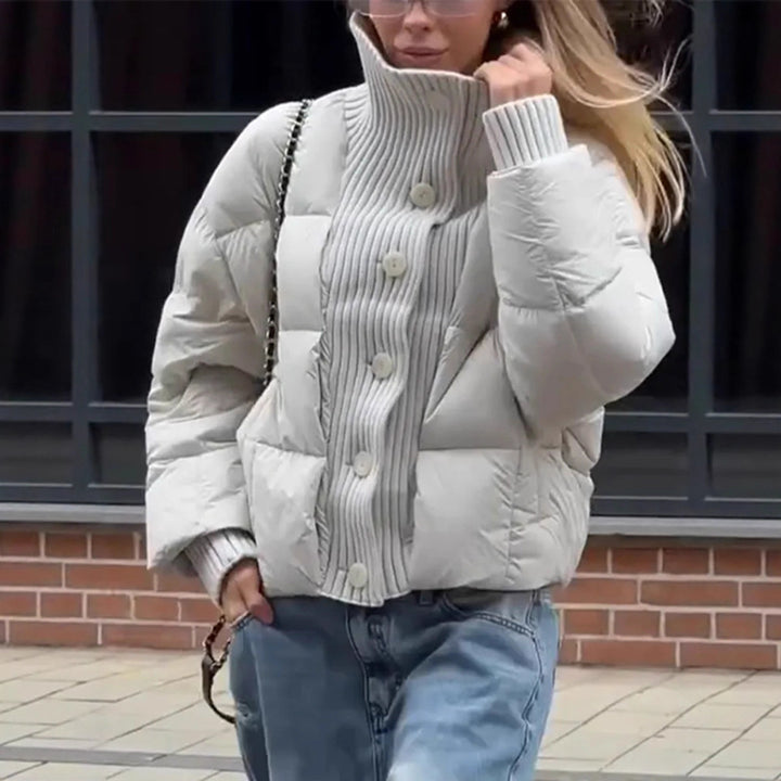 Damen gesteppte Jacke mit voluminösem Kragen und praktischen Knopfdetails Drune