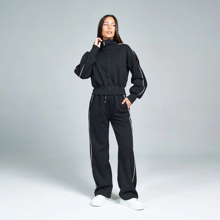 Damen sportliches Freizeit-Set mit hochgeschlossener Jacke und weit geschnittenen Hosen Drune