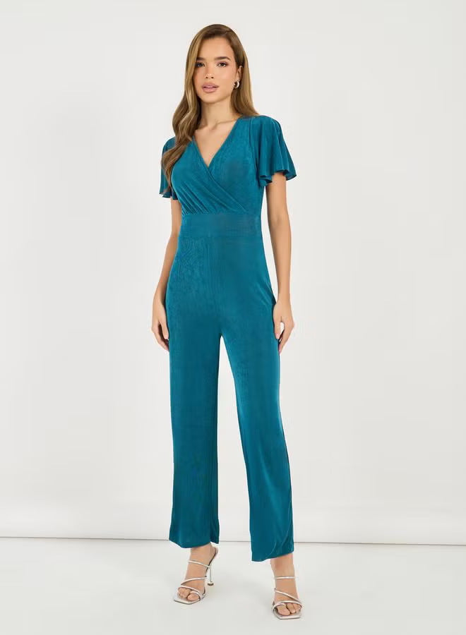 Damen eleganter Jumpsuit mit fließendem Schnitt und detailreichen Puffärmeln Drune