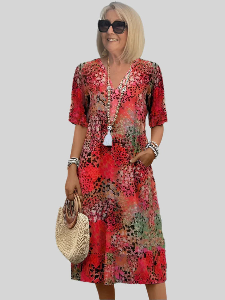 Damen Blumenmuster Midi Kleid mit Taschen Drune