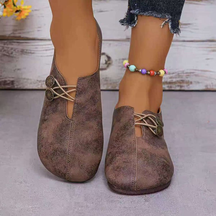 Damen Komfortable und stilvolle Slipper mit dekorativen Schnürdetails Drune