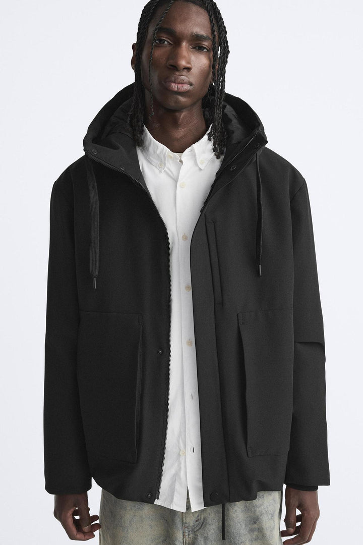 Herren moderne wasserabweisende Jacke mit Kapuze und praktischen Taschen Drune