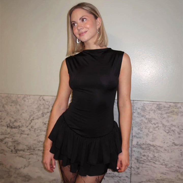Damen Rüschen-Minikleid mit figurbetontem Oberteil und fließendem Stoff Drune