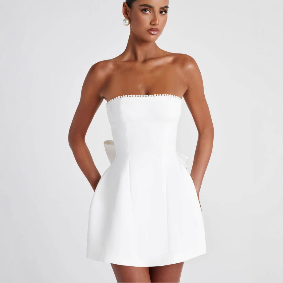 Damen Cocktailkleid mit schulterfreiem Design und perlenverziertem Saum Drune