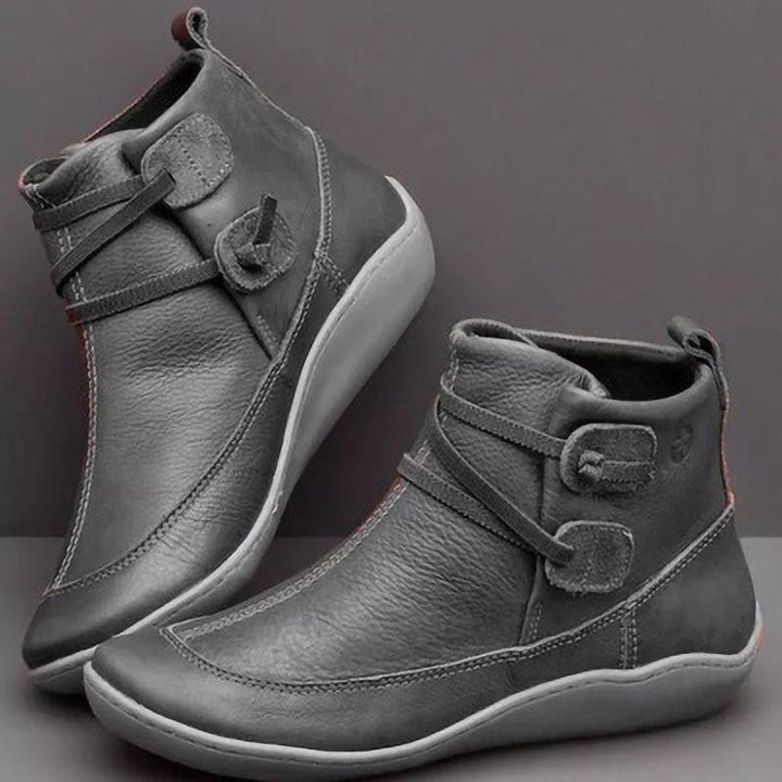Damen nan knöchelhohe Softleder-Slipperstiefelette mit Schlaufen-Wickelriemen und ergonomischer Gummilaufsohle Drune