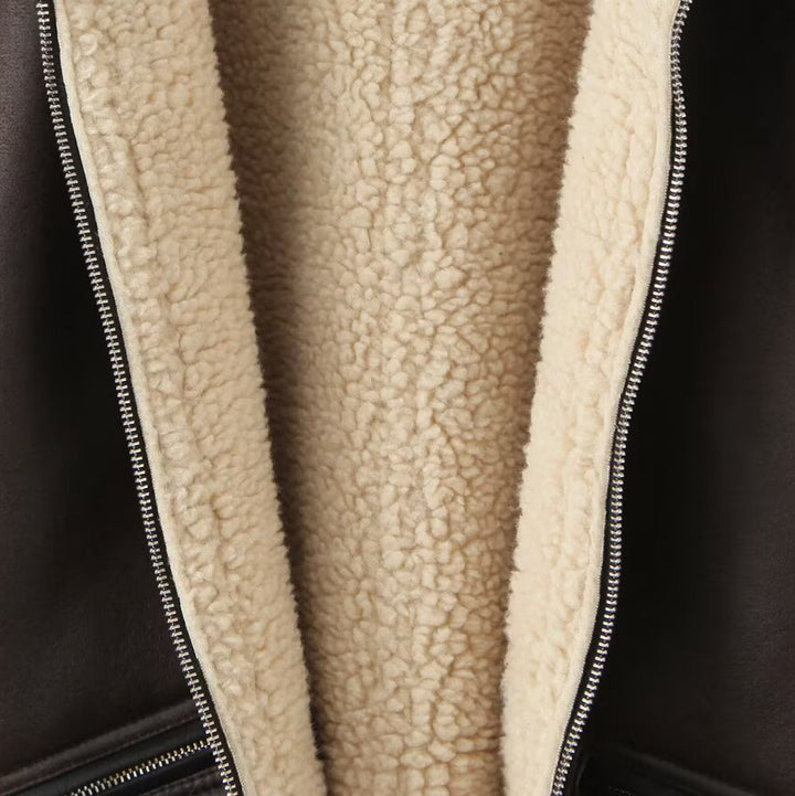 Damen Kunstlederjacke mit warmem Sherpa-Futter und praktischen Reißverschlusstaschen Drune