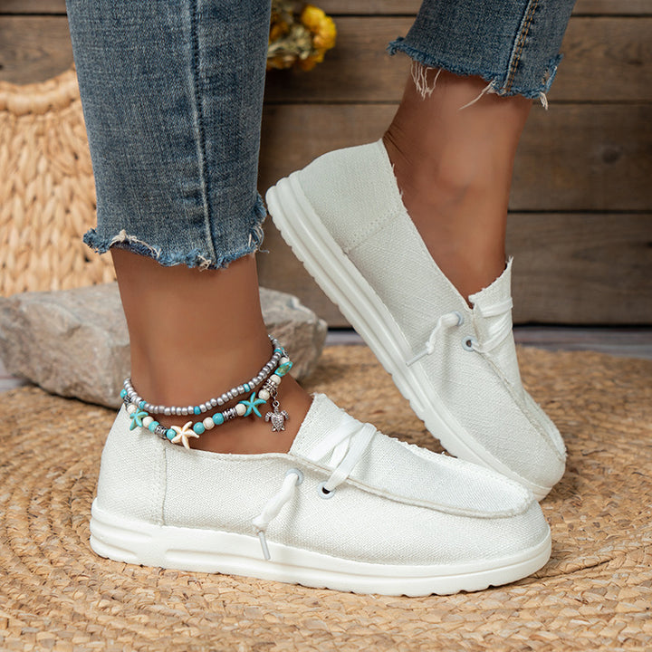 Damen nan leichte Canvas-Slipper mit dekorativer Schnürung, gepolstertem Komfortfußbett und rutschfester Leichtlaufsohle Drune
