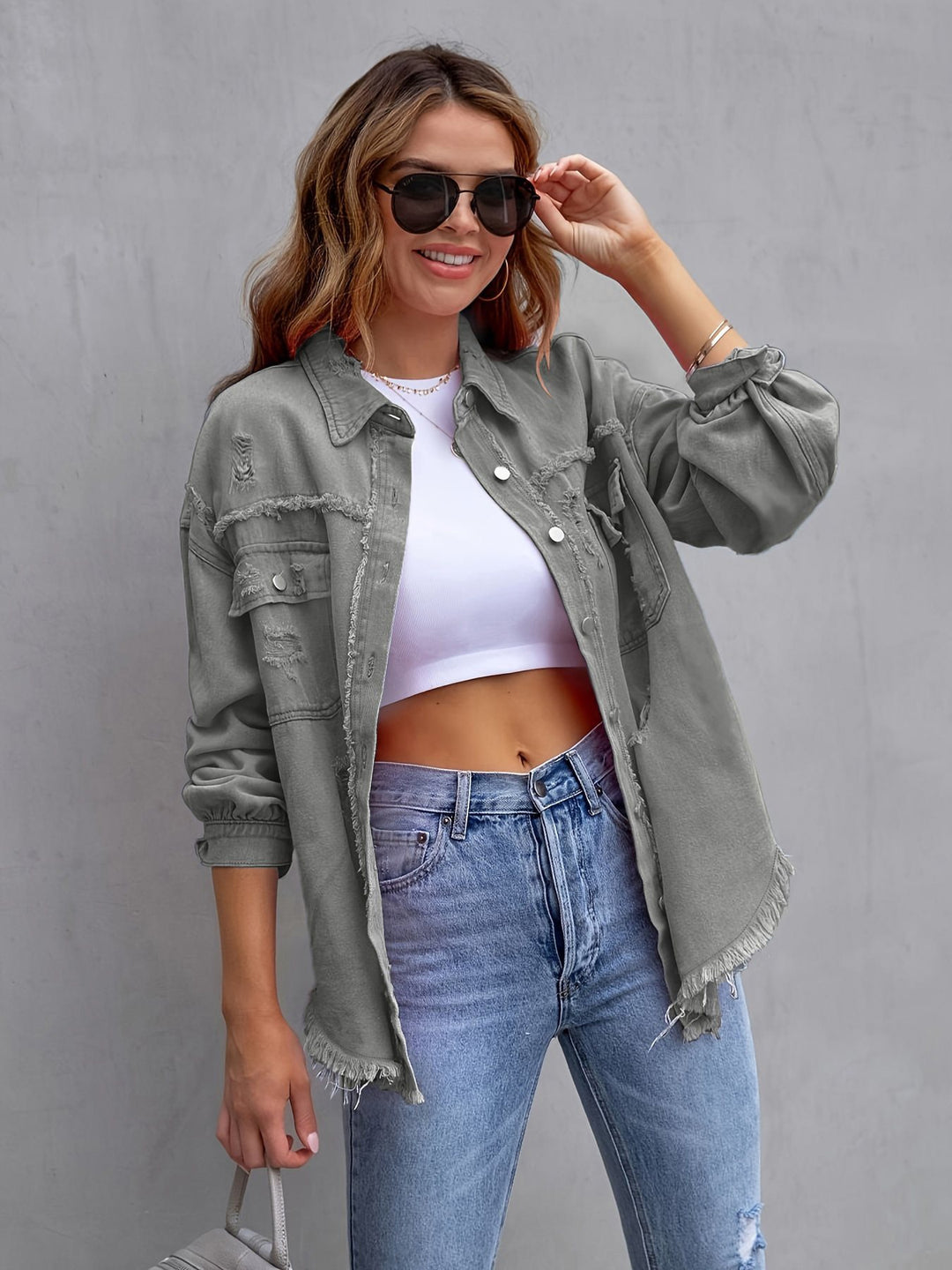 Damen oversized Jeansjacke mit fransigen Säumen und aufgesetzten Taschen Drune