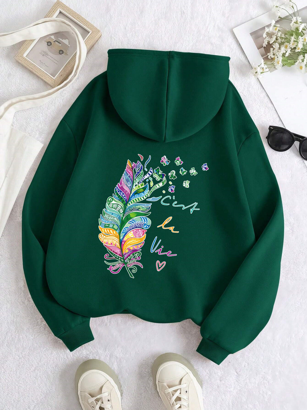 Damen lässiger Kapuzenpullover mit buntem Federdesign und inspirierendem Schriftzug Drune