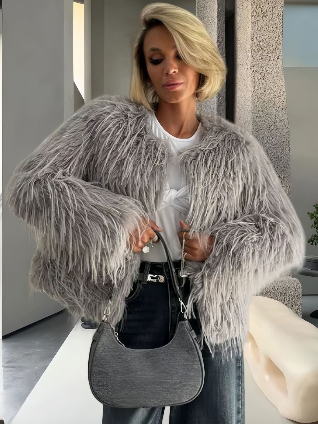 Damen Modische Kunstpelzjacke mit voluminösen Ärmeln Drune
