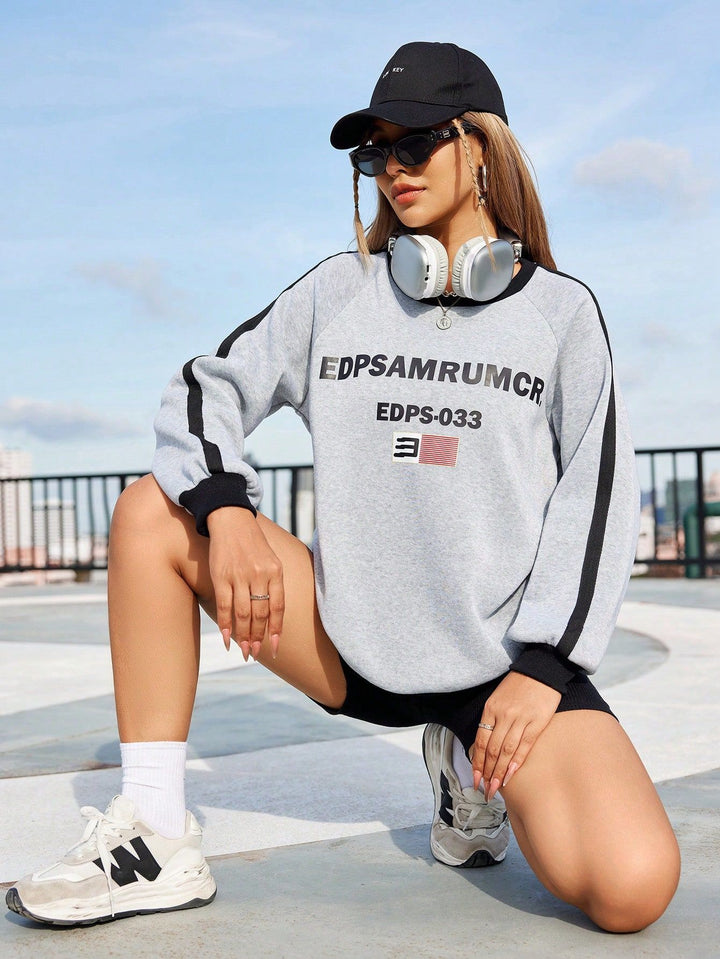 Damen lässiger Sweatshirt mit grafischem Druck und kontrastierenden Ärmeln Drune