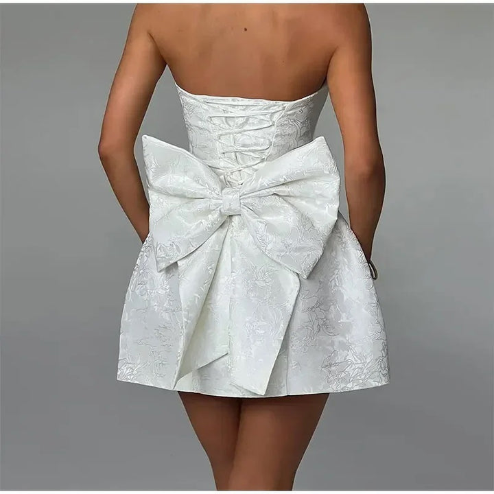 Damen kurzes Kleid mit strukturiertem Oberteil und verspieltem Schleifendetail Drune