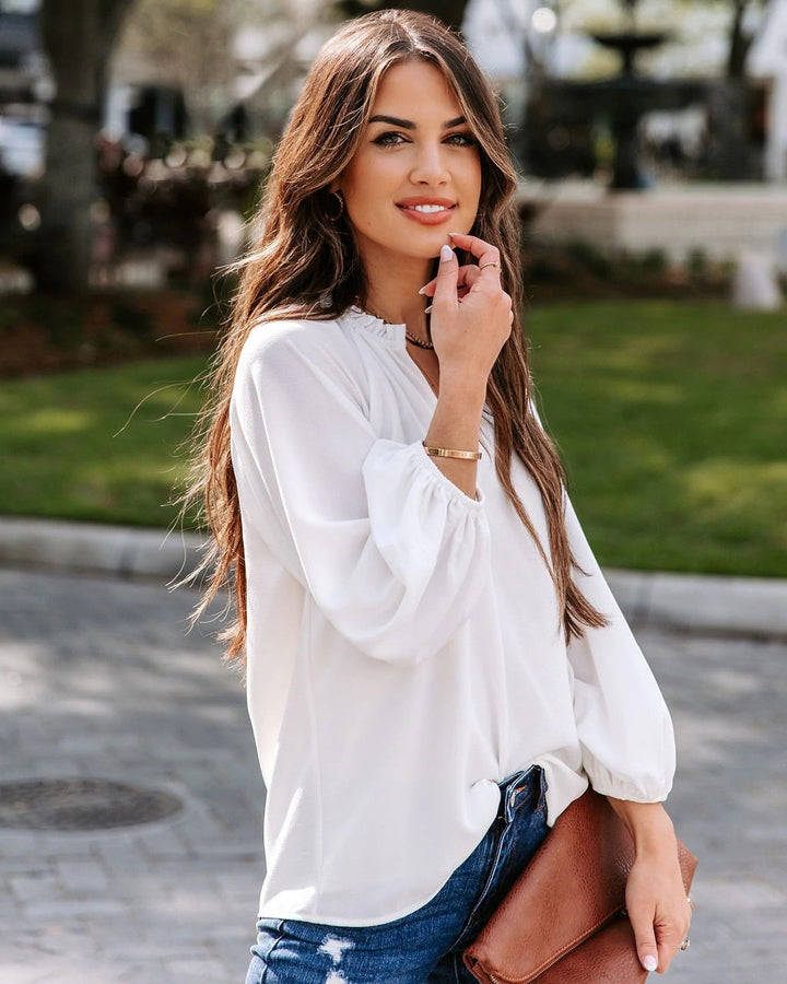 Damen Bluse mit tiefem V-Ausschnitt und eleganten Puffärmeln Drune