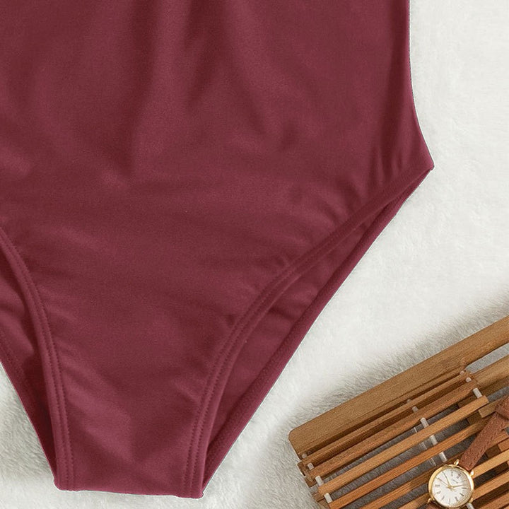 Damen Einteiler Badeanzug mit eleganten Kurzärmel und tiefem V-Ausschnitt Drune