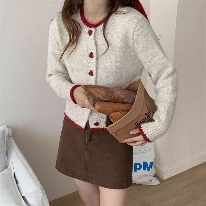 Damen kuschelige Strickjacke mit Herzknöpfen und raffinierter Ärmelgestaltung Drune