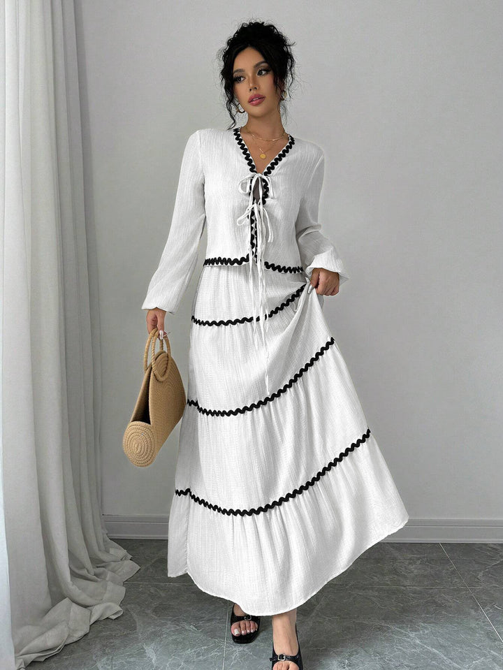 Damen Maxi-Kleid mit verspieltem Schnürungsausschnitt und elegantem Rüschenboden Drune