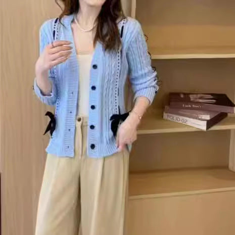Damen Strickjacke mit dekorativen Taschen und Wellenmuster Drune