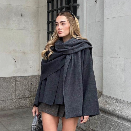 Damen nan zweilagiger Strickponcho mit asymmetrischem Saum und dekorativem Knopfkragen Drune