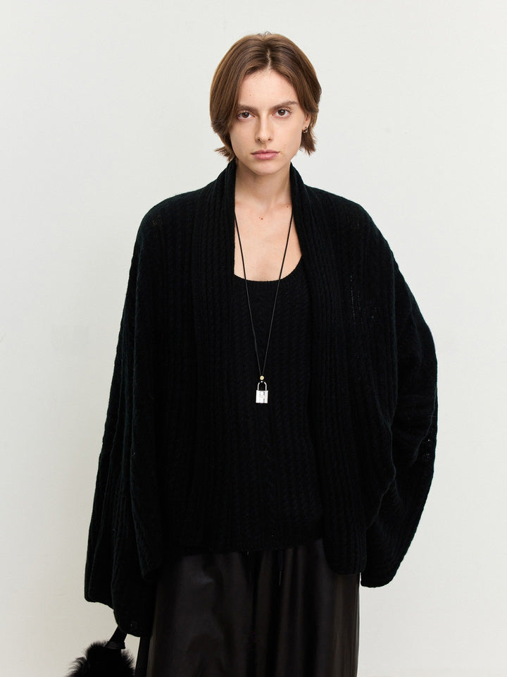 Damen luftiger Strickponcho aus feiner Wolle Drune